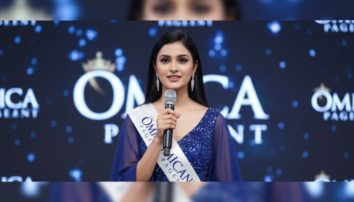 Indian beauty pageant contestant with Omica Pageant sash holding a microphone during interview round- banner