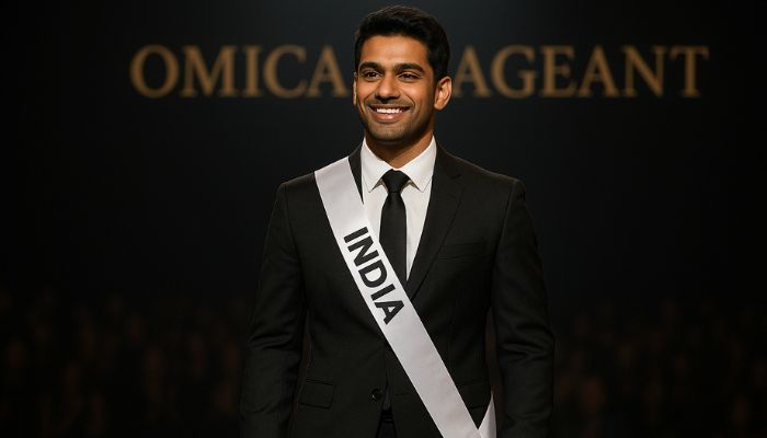 AI-generated image of a confident Indian male contestant at Omica Pageant, standing on stage in a black suit under spotlight with blurred audience in the background.